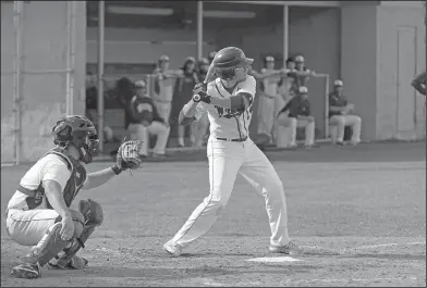  ?? Terrance Armstard/News-Times ?? Awaiting the pitch: El Dorado's Noah Gaul waits for a pitch during the Wildcats' contest against Lake Hamilton in the 6A West Conference Tournament last season. After missing the state tournament in 2017, the Wildcats are hoping to rebound with Cannon...