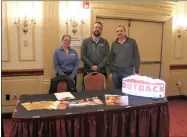  ??  ?? Tonya Westerkamp, Nate Reardon and Kevin Goggins represent Outback Steakhouse at the Restaurant Industry Career Fair on Monday in Albany.