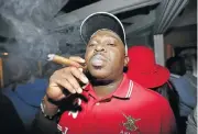  ?? Picture: ADRIAN DE KOCK ?? HAVANA GOOD TIME: Mpho Mabusela enjoys a cigar at Le Roi