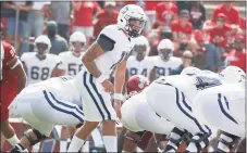  ?? Gary Kazanjian / Associated Press ?? UConn quarterbac­k Jack Zergiotis steps to the line against Fresno State during the season opener.