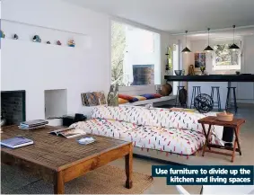  ??  ?? Use furniture to divide up the kitchen and living spaces