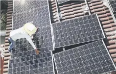  ??  ?? China’s Ministry of Industry and Informatio­n Technology said the outlook for solar firms’ expansion overseas was not optimistic, because of protection­ist sentiment, as Chinese solar panels are a key target of global trade investigat­ions. — AFP photo