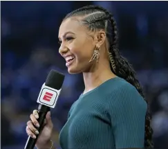  ?? ASSOCIATED PRESS FILE PHOTO ?? Malika Andrews speaks during a 2021game between the Golden State Warriors and the Phoenix Suns in San Francisco.