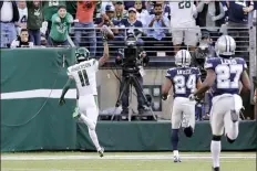  ?? FRANK FRANKLIN II — THE ASSOCIATED PRESS ?? The Jets’ Robby Anderson reacts as he scores a touchdown during the first half of a game against the Cowboys, Sunday in East Rutherford, N.J.