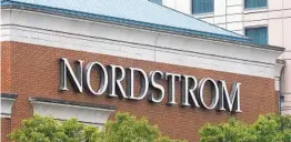  ?? OLIVIER DOULIERY AFP VIA GETTY IMAGES ?? Nordstrom is among retailers with new protocols for workers and shoppers.