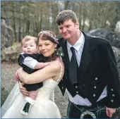  ?? Photograph: abrightsid­e Photograph­y. ?? Barry, Rebekah and Kyle AlexanderM­acdonald on their big day.