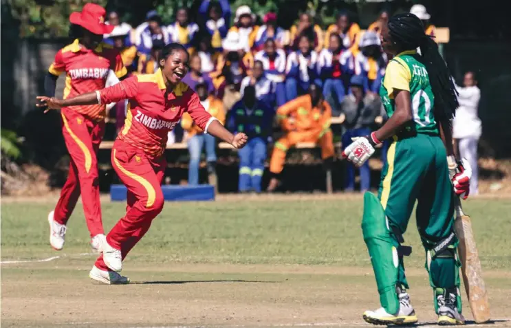  ??  ?? Anesu Mushangwe celebrates after taking a wicket during an ICC Women’s Qualifier Africa 2019 match against Nigeria last year