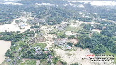  ??  ?? GAMBAR terkini di Kampung Kolopis Penampang yang sempat dirakamkan dari udara.