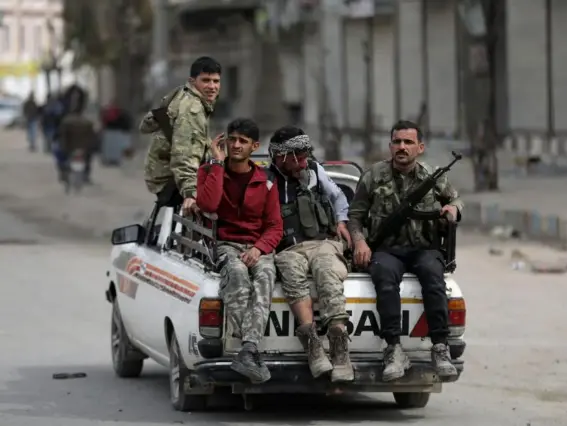  ?? (Reuters) ?? Turkish-backed Free Syrian Army soldiers are likely to remain in the city