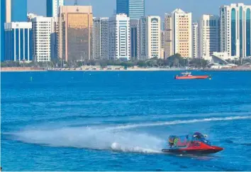  ?? Courtesy: Organisers ?? Team Abu Dhabi’s Al Qamzi snatched the lead on the first lap and held off a fierce challenge from Frenchman Morin to seal the win by 0.91 seconds at the Abu Dhabi Breakwater.