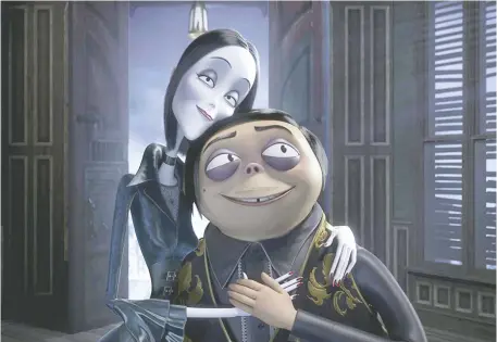  ?? MGM ?? Charlize Theron voices Morticia, left, and Oscar Isaac is Gomez in the new silly and familiar animated version of The Addams Family.