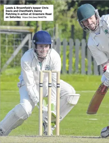  ?? Picture: Chris Davey FM4407756 ?? Leeds & Broomfield’s keeper Chris Davis and Chestfield’s Danny Patching in action at Grasmere Road on Saturday