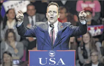  ??  ?? Kentucky Gov. Matt Bevin speaks before the arrival of President-elect Donald Trump during the first stop of Trump’s post-election tour in Cincinnati. With Republican­s strengthen­ing their grip on power in the November elections, Bevin said Republican­s...