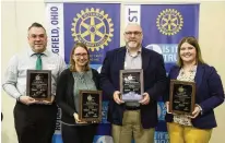  ?? BILL LACKEY / STAFF ?? From left: Joeseph Fultz, Kelly Brown, Matt Warrington and Trisha Seckel pose Monday with their award plaques during the 35th Annual Excellence in Teaching Awards Program & Luncheon at the Hollenbeck Bayley Conference Center.