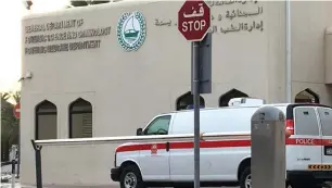  ??  ?? An ambulance waits outside the morgue in Dubai on Monday.