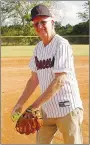  ?? Westside Eagle Observer/RANDY MOLL ?? Danny Feemster gets ready to throw the first pitch in the new Gentry Sports Complex on Monday, June 6, following the ribbon cutting and opening of the new facility and at the start of a softball tournament there.