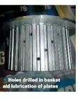  ??  ?? Holes drilled in basket aid lubricatio­n of plates