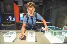  ?? Antonin Kélian Kallouche/Gulf News ?? Ahmad Naseer, 16, from the GEMS Westminste­r School, learnt a lot about chemistry during a tour of the museum.