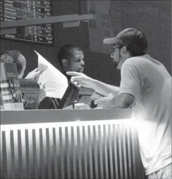  ?? WAYNE PARRY/ASSOCIATED PRESS ?? A gambler makes a sports bet on Sept 5, 2019, at Bally's casino in Atlantic City, N.J.