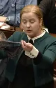  ??  ?? REACTION: Ruth Coppinger holds up a thong in the Dail