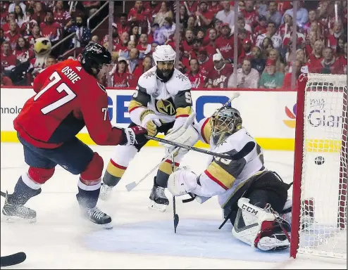  ??  ?? The Capitals’ T.J. Oshie scores a first-period goal past Golden Knights goaltender Marc-Andre Fleury during Game 4 of the Stanley Cup final at Capital One Arena in Washington last night. Gregory Shamus/Getty Images