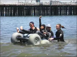  ?? JEANINE OLSON — SHARED ADVENTURES ?? A floating wheelchair helps to enhance access to the sanctuary.