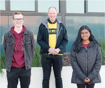  ??  ?? College captains Ethan Miller and Kalai Sathyaseel­an with principal Peter Houlihan.