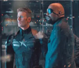  ??  ?? Cap (Chris Evans) and Nick Fury (Samuel L. Jackson) lead “Captain America: The Winter Soldier,” the center of the Marvel Universe. PHOTOS BY MARVEL