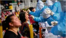  ?? (Photo AFP ?? Les autorités sanitaires locales de Qingdao vont procéder au dépistage de l’ensemble de la population.