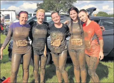  ??  ?? The five mortgage staff from Hinckley and Rugby Building Society who took on the Wolf Run to raise money for breast cancer charity Pink Pants. Pictured: (L-R) Diane Stokes, Michelle Tong, Sarah Johnson, Angela Price and Michelle Higginson