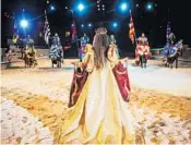  ?? JACOB LANGSTON/STAFF PHOTOGRAPH­ER ?? Christina Carmona, as Queen Donna Maria Isabella, greets her knights during a rehearsal Thursday at Medieval Times.