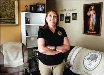  ?? AMY OSBORNE/THE WASHINGTON POST ?? Joyce Thomas-Villaronga, SEIU union representa­tive, poses for a portrait in her home in Vacaville, California, on Friday.