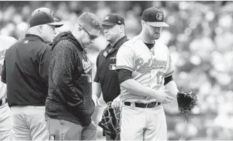  ?? JIM MCISAAC/GETTY IMAGES ?? Orioles starting pitcher Alex Cobb leaves the game after throwing four pitches against the Yankees. With only a week remaining in the regular season, Cobb will not pitch again in 2018.