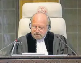  ?? AP PHOTO ?? Presiding judge Ronny Abraham of France reads the verdict in Kulbhushan Yadav case in The Hague, Netherland­s