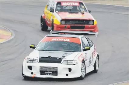  ?? Picture: Tony Alves. ?? FAST STUFF. Keegan Pottas (EV Dynamics Honda CRX) and Adrian Dalton (Extra Clothing Golf) should be front runners in Saturday’s Motul Modified Production Car races at Midvaal.