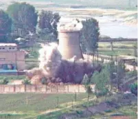  ?? ASSOCIATED PRESS FILE PHOTO ?? A 60-foot-tall cooling tower at North Korea’s main reactor complex is destroyed in Yongbyon in 2008. North Korea’s Foreign Ministry said Saturday it will hold a ‘ceremony’ for the dismantlin­g of its nuclear test site on May 23-25.