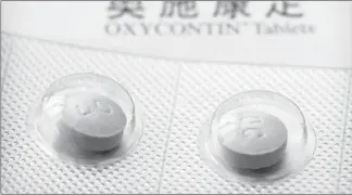  ?? MARK SCHIEFELBE­IN/AP ?? Documents and interviews indicate that representa­tives from the Sackler family’s Chinese affiliate, Mundipharm­a, tell doctors that OxyContin is less addictive than other opioids.