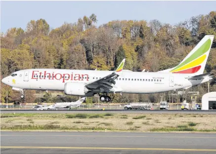  ?? PRESTON FIEDLER
AP ?? The actual Ethiopian Airlines Boeing 737 Max 8 plane that crashed Sunday shortly after take-off from Addis Ababa, Ethiopia, shown as it lands at Seattle Boeing Field King County Internatio­nal airport on Nov. 12. •