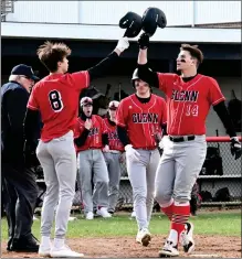  ?? ?? RIGHT: Glenn’s Joe Chrapliwy (8) celebrates with Brycen Hannah after Hannah’s two-run home run Thursday.
LEFT: Glenn’s Joey Shoue gets one of his two hits against Penn on this swing.