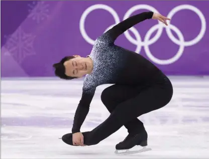  ?? The Canadian Press ?? Canada’s Patrick Chan skates in the men’s singles short program at the PyeongChan­g 2018 Olympic Winter Games in South Korea on Thursday night. Chan placed sixth, with 90.01 points.