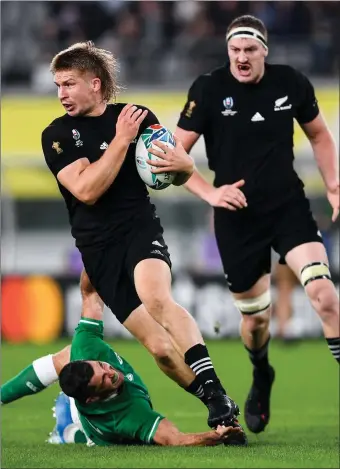  ??  ?? Jack Goodhue of New Zealand on the charge in the Rugby World Cup quarter-final against Ireland.