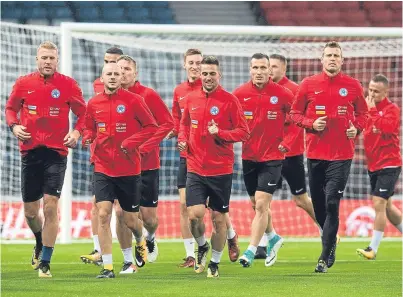  ?? Picture: SNS. ?? The Slovakian squad train at Hampden last night ahead of tonight’s crunch World Cup qualifier.