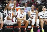  ?? SEAN RAYFORD — THE ASSOCIATED PRESS ?? South Carolina forward Aliyah Boston (4), Victaria Saxton (5) and Sania Feagin (20) react to a blocked shot during the second half of an NCAA college basketball game against Kentucky Sunday in Columbia, S.C. South Carolina won 74-54.