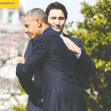  ?? JIM WATSON / AFP / GETTY IMAGES FILES ?? Then-president Barack Obama embraces Justin Trudeau on the South Lawn of the White House during the prime minister’s state visit in March 2016.