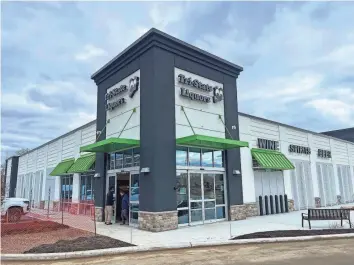  ?? PHOTOS BY MATTHEW KORFHAGE/DELAWARE NEWS JOURNAL ?? Tri-State Liquors, founded in Claymont in 1984, was the final tenant of Tri-State Mall. The 39-year-old store reopened in a new location next door, at 383 Naamans Road, on Thursday.