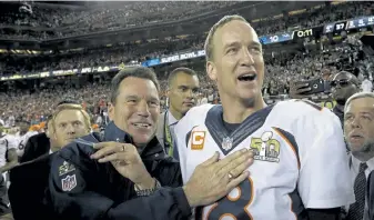  ?? David J. Phillip, The Associated Press ?? Broncos QB Peyton Manning celebrates with head coach Gary Kubiak after winning Super Bowl 50 on Feb. 7, 2016. The Broncos beat the Carolina Panthers 24-10.