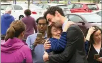  ?? ALEX SANZ — THE ASSOCIATED PRESS ?? Then-Democratic Congressio­nal candidate Jon Ossoff greets supporters outside of the East Roswell Branch Library in Roswell, Ga.