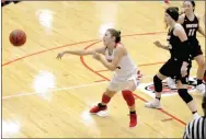  ?? MARK HUMPHREY ENTERPRISE-LEADER ?? Farmington senior Alexis Roach passes to the wing during the Lady Cardinals’ 56-34 conference win over Gentry at Cardinal Arena on Jan. 8.