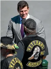  ??  ?? Australia’s most decorated soldier, Ben Roberts-Smith, speaks to Veterans Australia motorcycle Club members ahead of the Remembranc­e Day Service at the Australian War Memorial on November 11, 2018 in Canberra. GETTY IMAGES