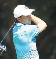  ?? Tom Pennington / Getty Images ?? Jordan Spieth plays his shot from the 14th tee during the third round on Saturday.